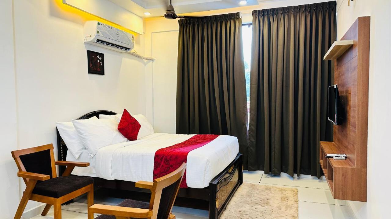 Hotel Achoos Residency Tiruvalla Esterno foto