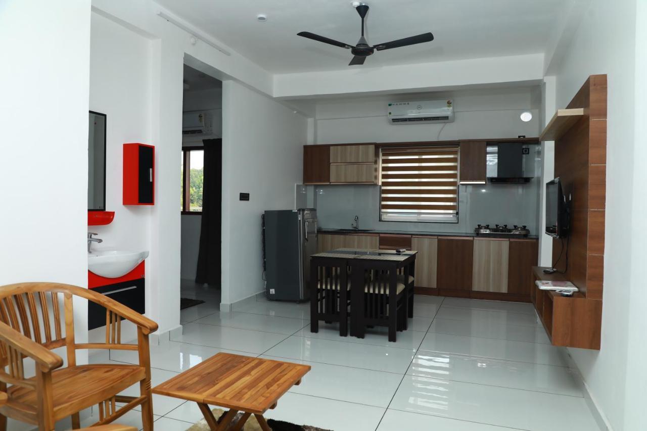 Hotel Achoos Residency Tiruvalla Esterno foto