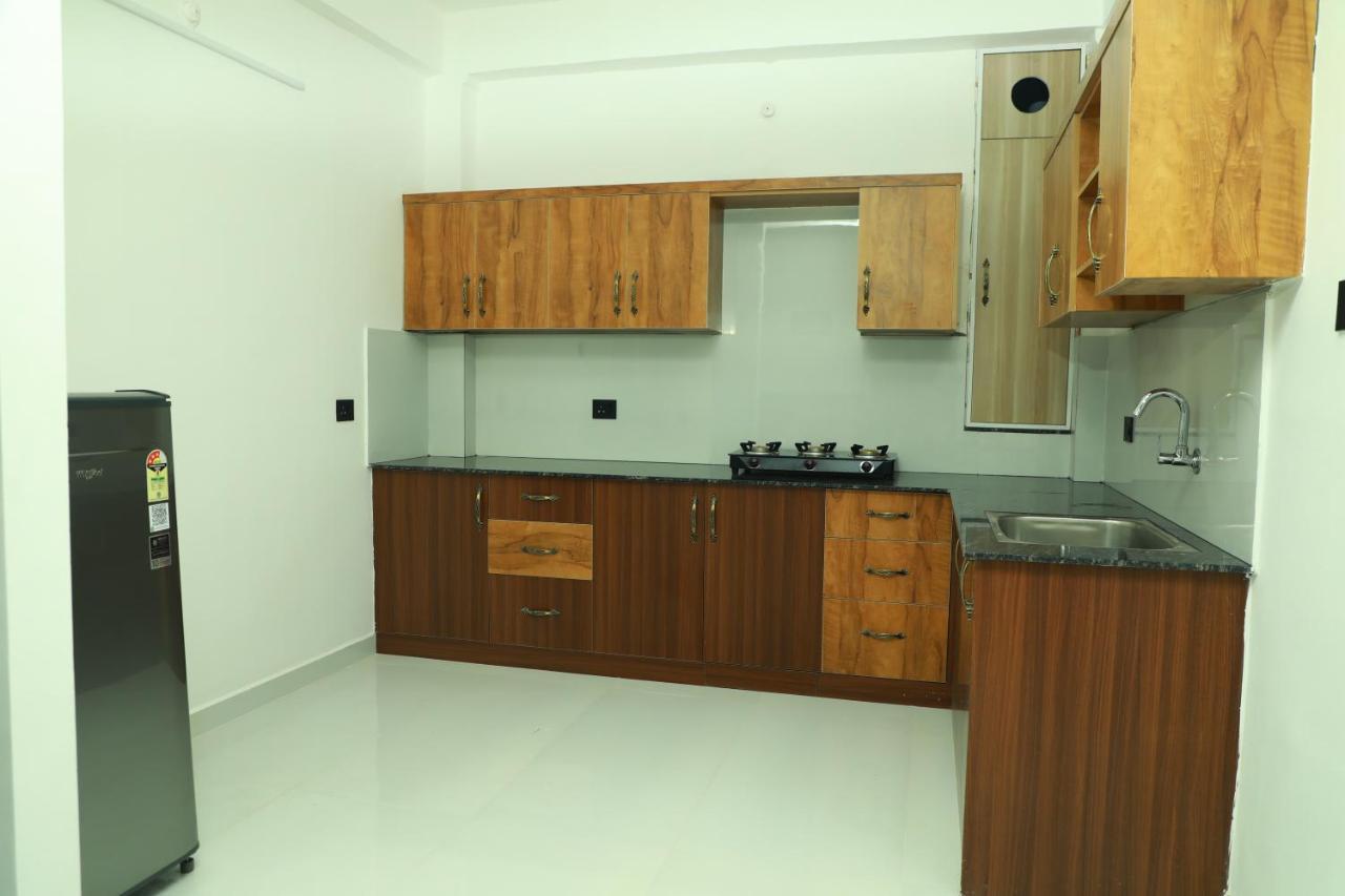 Hotel Achoos Residency Tiruvalla Esterno foto
