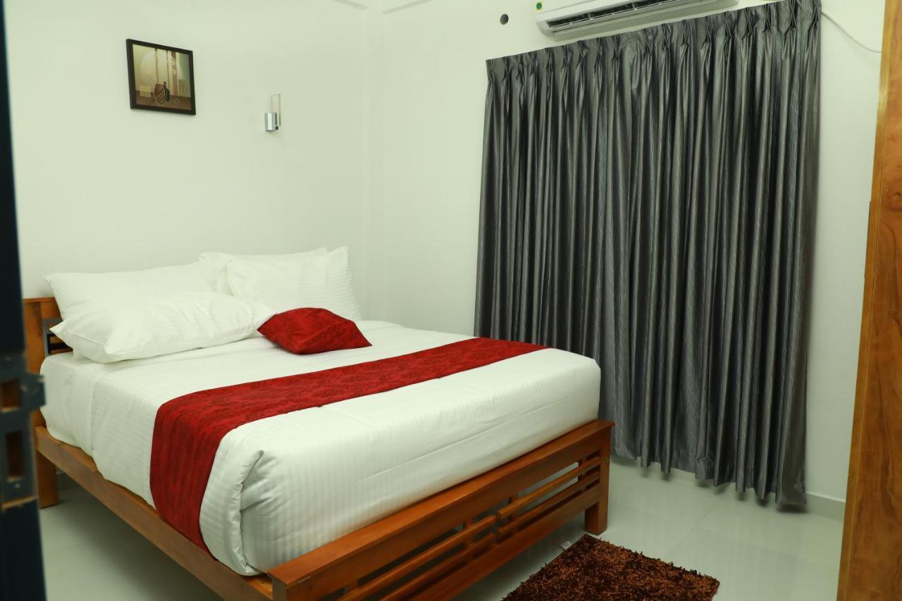 Hotel Achoos Residency Tiruvalla Esterno foto